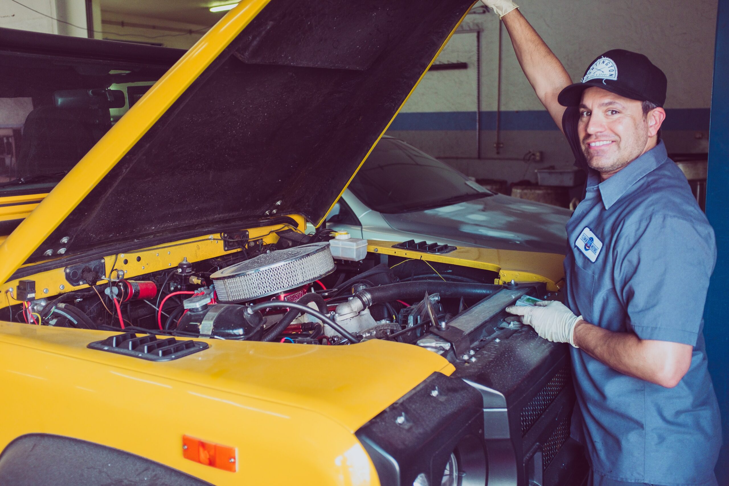 Mechanic Fixing the yellow car
